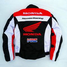 the jacket is black, white and red with honda on it's back side