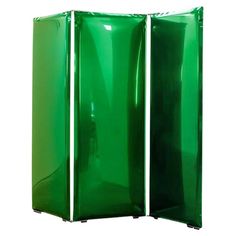 a green room divider with two doors on each side