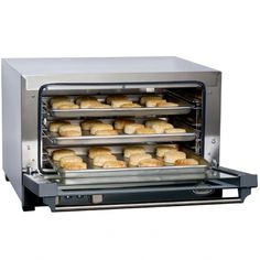 an oven with several trays of bread baking in it's front door, on a white background