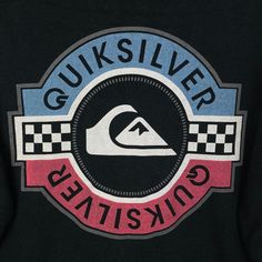 a black sweatshirt with the words quiksilver and a checkerboard design