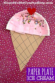 an ice cream cone with sprinkles and a heart on top that is made out of paper