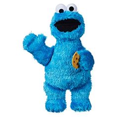 a blue stuffed animal with big eyes and a cookie on it's chest, standing upright