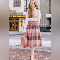 Trendy Plaid Print. - Pleated From Waist - Concealed Back Zip Closure - Lined - 60% Wool; 40% Polyester - Dry Clean Relaxed Pink Skirt For Fall, Pink Midi Skirt For Fall, Pink Fall Midi Skirt, Pink Long Skirt For Fall, Long Pink Skirt For Fall, Pink Flowy Skirt For Fall, Chic Pink Bottoms For Winter, Flowy Pink Bottoms For Fall, Flowy Pink Skirt For Fall