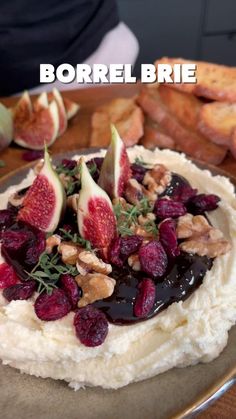 a plate with food on it and the words borrel brie above it