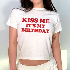 Kiss Me It's My Birthday 90s Baby Tee, Aesthetic Tee, Women's Fitted Tee, Unisex Shirt, Gift for Friend, Y2K Baby Tee, 90s Style Tee DETAILS - 100% cotton (fiber content may vary for different colors) - tear-away label  SIZING Sizes vary by shirt style. Please check the size chart before making your purchase. PLEASE NOTE: Our Baby tee is sized for a youth, reminiscent of the '90s-era shrunken-down T-shirt. This style, popularized by the skater/raver culture of the time, is not to be confused wit Birthday Tanks For Women, Kiss Me Its My Birthday, Casual White Top For Birthday, Vintage White T-shirt For Birthday, Vintage Text Print Top For Birthday, Casual Birthday Tops With Letter Print, Casual Slogan Tops For Birthday, Casual Slogan Tops For Birthdays, Casual Letter Print Top For Birthday