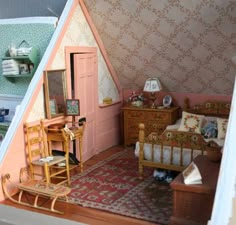 a doll's house with furniture and accessories in it