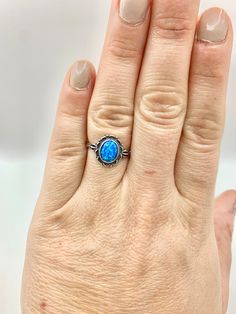 "Welcome to Darling Grace! This ring is a gorgeous blue opal ring. The blue color on this ring is so mesmerizing.  Size: 7 Metal Purity: 925 Sterling Silver Stone: Blue Opal Free Shipping!  Comes packaged in a ring box ready to gift! Consider upgrading your box to black leather and purchasing a cleaning cloth during check out.  You can take a peek of these options in the \"Essentials\" section.  Thank you!" Affordable Rings, Rings Opal, Fire Blue, Blue Opal Ring, Rings Unique, Rings Vintage, 925 Silver Ring, Blue Band, Opal Ring