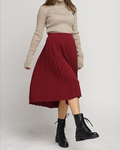 Woolen Midi Skirt is our shop's new items. Knitted from 100% Italian superfine merino wool. Classic and Warm Vinter Wool Pleated Skirt easily match any tops. The skirt is very soft, pleasant to the body. Ideal fit on any shape, and is suitable for sensitive skin. It will keep you warm in cold weather and comfortable for use the whole season.  Color Burgundy: Sizes L,XL available Measurements lying flat are: Lenght: 27,5" / 70cm Waist: 15-15,7" / 38-40 cm and more - skirt with slightly elastic wa Chic Ribbed Fall Skirt, Chic Ribbed Skirt For Fall, Chic Ribbed Winter Skirt, Elegant Non-stretch Winter Pleated Skirt, Stretch Winter Skirt, Red Asymmetrical Skirt For Fall, Red Asymmetrical Fall Skirt, Long Pleated Skirt For Winter, Chic Winter Midi Skirt