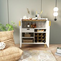 a living room with a couch, coffee table and wine rack on the floor in front of it