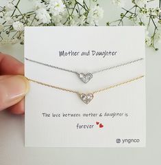 Mother and Daughter Necklace for Mom  Celebrate the lasting connection between a mother and child with this heartfelt heart charm necklace. Featuring a contemporary and dainty design, the necklace showcases a delicate 10mm CZ diamond pendant, gracefully hanging from a refined 16k gold-plated /  rhodium (silver). Versatile for everyday wear, it effortlessly enhances any ensemble with its understated elegance. This charming necklace is an ideal gift for Mother's Day, birthdays for daughters , or any significant occasion to express affection and gratitude. Perfect for not only mothers but also anyone dear to you, including yourself. Customization is available! Add a personalized message to make this gift even more special, creating a treasured keepsake that strengthens your connection with yo Double Heart Jewelry For Birthday And Mother's Day, Double Heart Jewelry For Birthday Gift And Mother's Day, White Heart Necklace For Mother's Day Gift, Mother's Day White Heart Necklace Gift, Mother's Day Jewelry With Heart Charm For Birthday Gift, Heart Cut Necklace For Birthday And Mother's Day, Heart Cut Necklace For Mother's Day And Birthday, White Heart Necklace With Birthstone For Mother's Day, White Birthstone Heart Necklace For Mother's Day