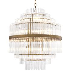 a large chandelier with clear glass rods hanging from it's center point