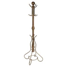 a metal coat rack with two hooks on it