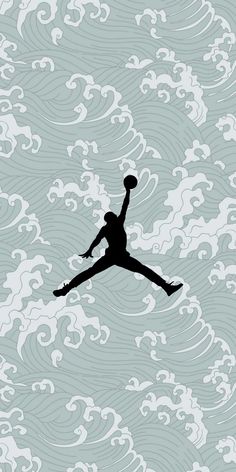 the silhouette of a person jumping in the air