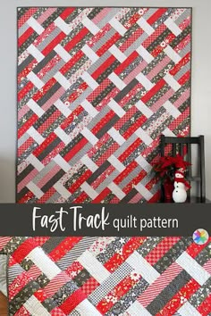 a red and black quilt with text overlay that says fast track quilt pattern on it