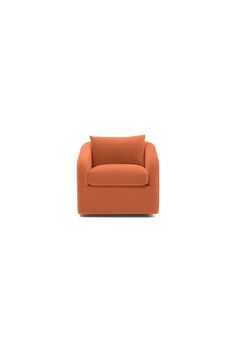 an orange couch sitting on top of a white floor