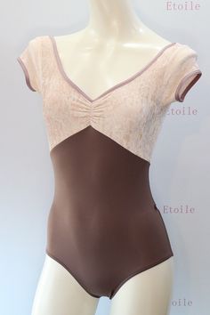 a female mannequin wearing a brown and tan bodysuit