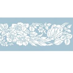 a blue and white wallpaper border with flowers on the borders, along with leaves