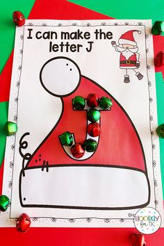 a christmas letter j craft with candy on it