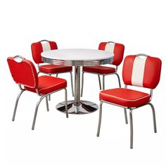 a white table with four red chairs and a round dining table on top of it