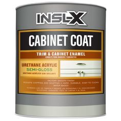 a white paint can with an orange stripe on the bottom and black lettering that reads, cabinet coat