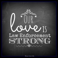 a chalkboard with the words our love is law enforcement strong