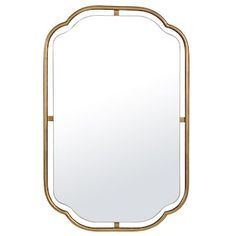 a gold framed mirror on a white background