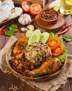 a wooden table topped with lots of different types of food on top of each other