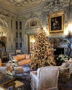 a decorated living room with a christmas tree