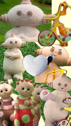 there are many different stuffed animals on the grass together and one is holding a heart