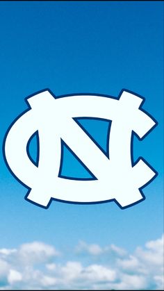 an image of the university of north carolina logo on a blue sky background with clouds