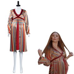 a woman standing next to a dress on a mannequin's dummy head