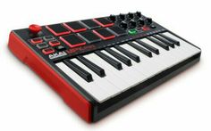 an electronic keyboard with red and black keys