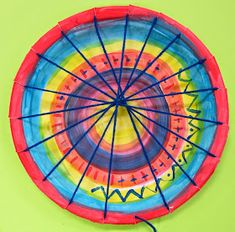 a colorful paper plate with writing on it