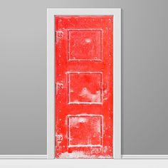 a red door is open on a gray wall