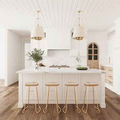 a white kitchen with three stools in front of the island