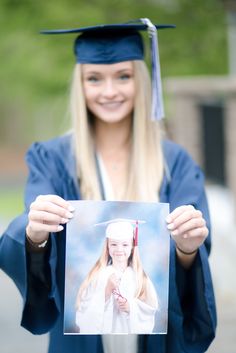 a young woman in graduation gown holding up a photo with the graduate's cap and gown on