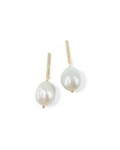 Please note due to the natural nature of baroque pearls, each pair may look different (colour, size and shape of the pearl) from the photos shown. gold vermeil over 925 sterling silver pavé white zirconia linear design with natural baroque pearls drops baroque pearl size approx. 14mm x 16.5mm total weight approx. 8.4g push back closure Linear Design, Natural Nature, Wedding Team, Solid Gold Rings, The Pearl, Single Earring, Cuff Earrings, Pearl Size, Pendant Bracelet