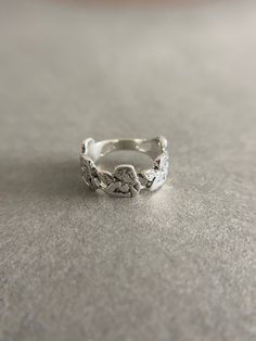 Sterling Silver Angel Ring - Sterling Silver ★ Quantity : One Ring ★ Color : Silver ★ Material : Sterling Silver ★ Ring Size : 5 / 6 / 7 / 8 / 9 / 10 ★ Angel Size : 8mm (5 Angels) ★ Band Size : about 8mm wide and 1mm thick ★ Peace Sing Size : 8mm ★ Comes in a jewelry box. If you need extra boxes for gifting....just let us know! Eye Ring Silver, Angel Band, Angel Ring, Silver Eye, Chicken Meatballs, Ring Color, Eye Ring, Silver Prices, Nov 1