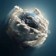 the earth is covered in clouds and sunlight