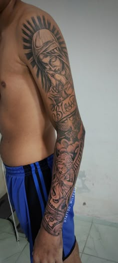 a man with a tattoo on his arm