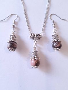 Rhodonite jewelry set Silver jewelry set Victorian set necklace and earrings Boho jewelry set Bohemian Rhodonite earrings Rhodonite jewelry Beautiful Victorian Rhodonite silver-tone jewelry set earrings and necklace. Rhodonite earrings . Rhodonite necklace. Rhodonite jewelry set. Rhodonite Dangle earrings . Boho jewelry set earrings and necklace . Bohemian jewelry set necklace and earrings . Rhodonite and silver-tone ornaments earrings and necklace jewelry set . Vintage style jewelry set . Antiq Rhodonite Necklace, Rhodonite Jewelry, Antique Style Jewelry, Silver Jewelry Set, Set Earrings, Silver Jewellery Sets, Vintage Style Jewellery, Set Necklace, Metal Ornament