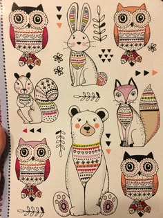 a drawing of an owl, bear, and rabbit with different patterns on it's body