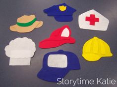 several felt hats and caps are arranged on a table with the words storytime kate written below them