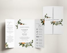 an open wedding program with orange flowers and greenery on the front, inside and out