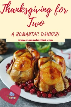 two roasted turkeys with cranberries on a white plate