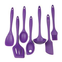 purple kitchen utensils lined up in a row