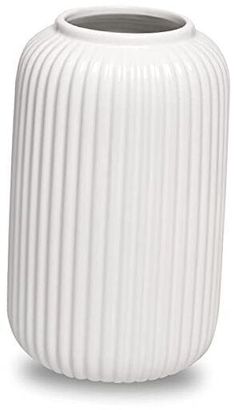 a white vase is shown on a white background