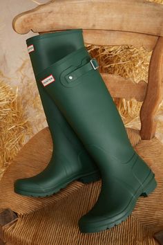 Gloomy days call for a splash-worthy look like the Hunter Original Tall Hunter Green Rain Boots! These matte rubber rain boots feature a rounded upper that rises to a 14.75"" knee-high shaft with a 15.5"" circumference. The easy slip-on design features a decorative silver buckle detail at the outstep, while a sturdy low-block heel completes the look. Logo tag at the front and sole. Available in whole sizes only. 0. 75" rubber heel. Lightly cushioned insole. Rubber sole has nonskid markings. Man Made Materials. Imported. Lulus | Original Tall Hunter Green Rain High Heel Boots | Size 8. Green Rain Boots, Tall Rain Boots, Gloomy Day, Low Block Heels, The Hunter, Logo Tag, Rubber Heels, Heel Boots, Hunter Green