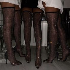 Step into sophistication with these Black Mesh Thigh High Heel Boots featuring stunning sparkly stiletto heels. These boots elevate any ensemble with their daring thigh-high mesh design, exuding confidence and style. Whether you're aiming for a glamorous night out or a bold fashion statement, these boots offer a secure fit and durability, ensuring you stand out with every step. Handcrafted US sizing. Fits true to size. Heel Height: 4.5" / 115 mm approx Product measurements were taken using size 8. Please note that measurements may vary by size. Versatile Style: Perfect for formal occasions, parties, or fashion-forward statements with a touch of edge. Quality Construction: Made from durable materials ensuring both style and lasting wear. Thigh High Heels, Jeweled Shoes, Rhinestone High Heels, Thigh High Boots Heels, Black High Heels, Heel Boots, Thigh High Boots, High Heel Boots, Thigh High