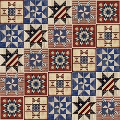 an old quilt with stars and stripes on it